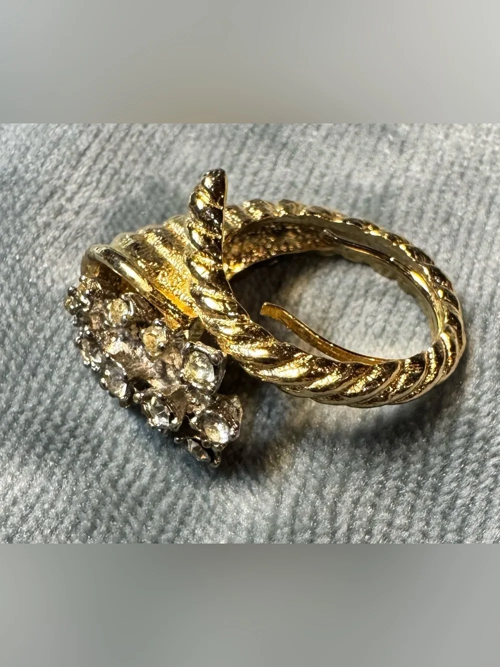 Vintage 19060s Cornucopia Cocktail Ring. Gold tone Ribbon Wrap and Rhinestones.
